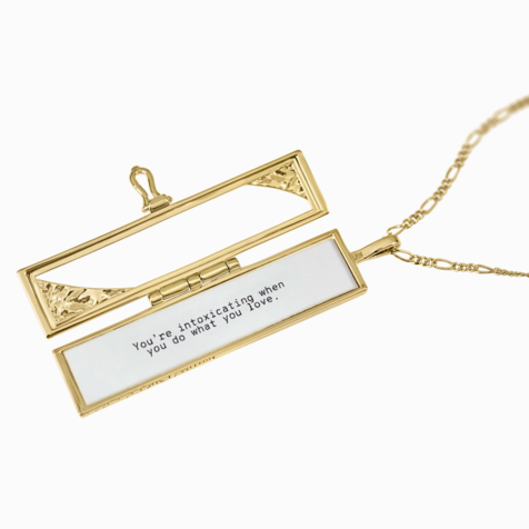 Gold plated brass locket that fits a love message within it.