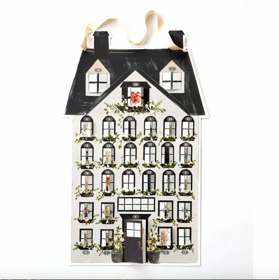 House-shaped Advent calendar with decorative elements on a white background