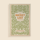 Book titled 'Our Bucket List Adventures' with green leafy design on a beige background