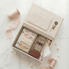 Open linen wedding keepsake box by for Keeps with a scent saver, fabric swatch keep and ceremony ring box packed inside
